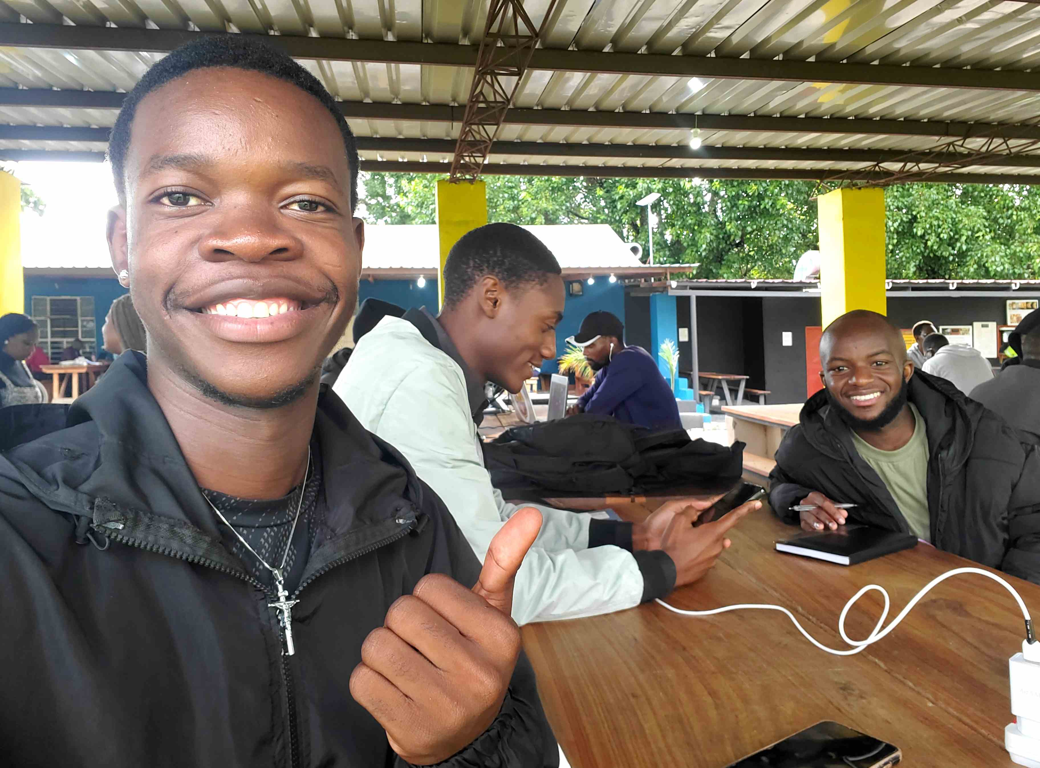 Joseph with Nzitsa cofounder James Lungu and Program Manager Dwight Sheba