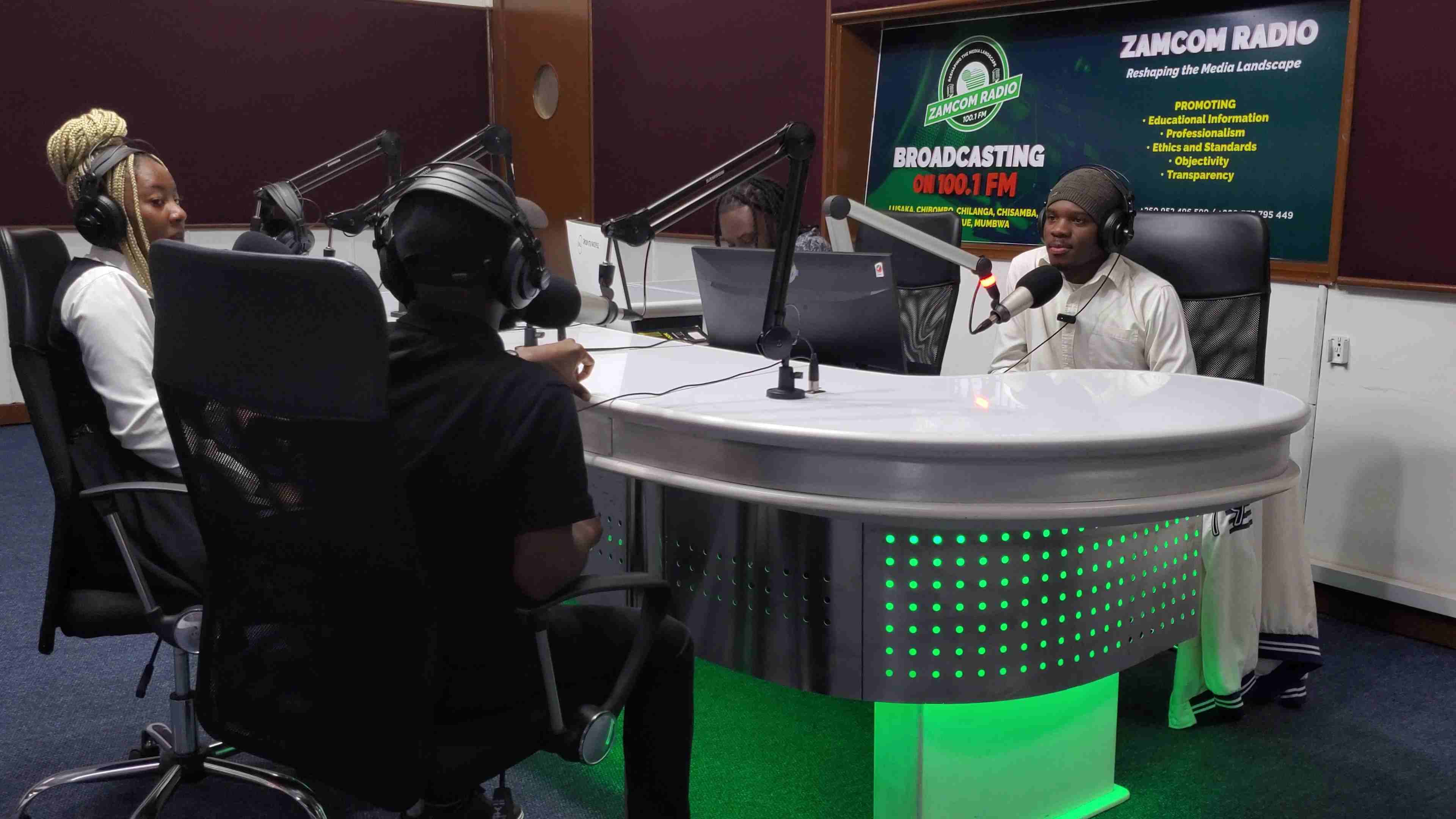 Joseph at ZAMCOM Radio during an interview